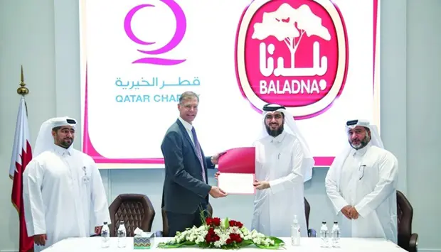 Blog Baladna Signs as Humanitarian Partner with Qatar Charity